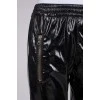 Patent black trousers