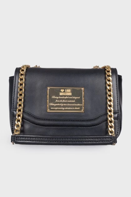 Leather bag with golden hardware
