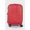 Red suitcase with logo