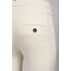 Cream trousers with tag