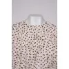Polka dot blouse with ruffles