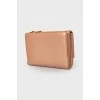 Powder colored leather wallet