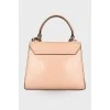 Powder colored leather bag