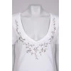 White T-shirt with beaded patch