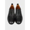 Black leather oxford shoes