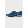 Gold and blue shoes lace-up closure