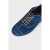 Gold and blue shoes lace-up closure