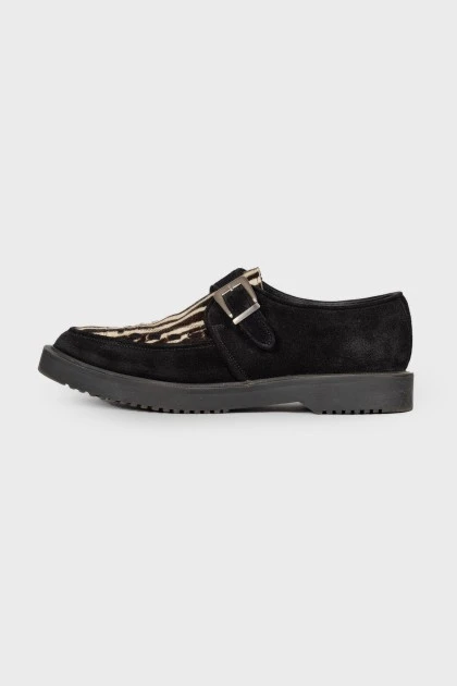 Black loafers with pony skin