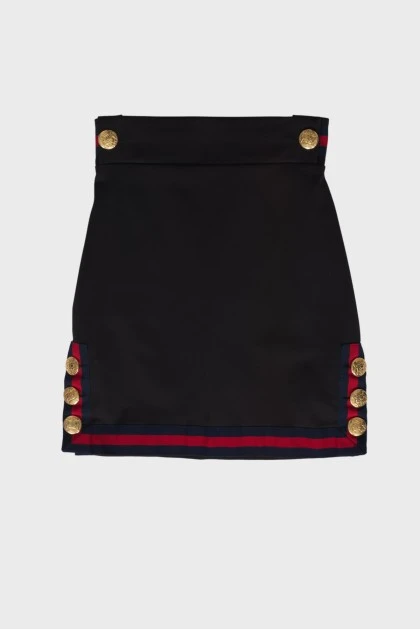 Black skirt with golden buttons