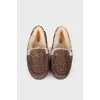 Loafers in print with fur