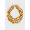 Golden pearl necklace