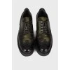 Black and green leather brogues
