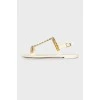 Sandals with gold-tone hardware