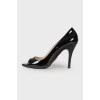 Peep-toe patent leather shoes