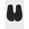 Black slippers with brand logo