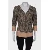 Beige pullover in lace print
