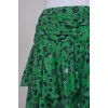 Green skirt with ruffles in print