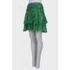 Green skirt with ruffles in print