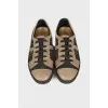 Textile black and gold sneakers