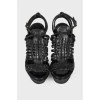 Black woven sandals