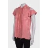 Pink sleeveless blouse