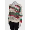 Knitted sweater with tag