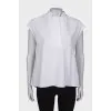 White sleeveless blouse
