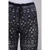 Patterned translucent trousers