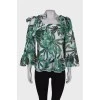 Blouse in green floral print