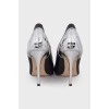 Leather shoes with silver heel