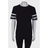 Black T-shirt with logo on the sleeves