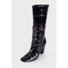 Patent boots with white seam