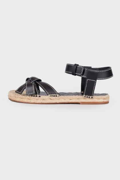 Leather sandals with woven soles