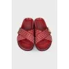 Red flip flops with brand logo