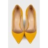 Leather yellow stilettos