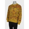 Men's mustard sweater with a pattern