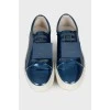 Blue sneakers with metallic decor