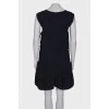 Navy blue dress with lace at the hem