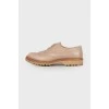 Beige leather brogues