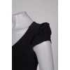Black dress with drapery on the shoulders