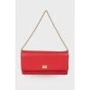 Red embossed clutch