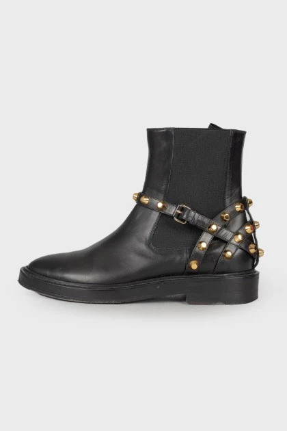 Leather boots with golden studs