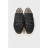 Perforated leather slip-ons