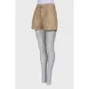 Beige pleated shorts