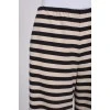 Striped trousers with tag