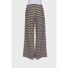 Striped trousers with tag