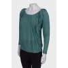 Dark turquoise blouse with drapery 