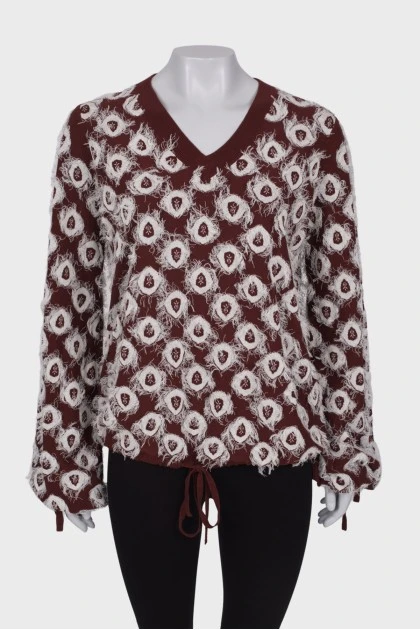 Brown sweater with embroidered print