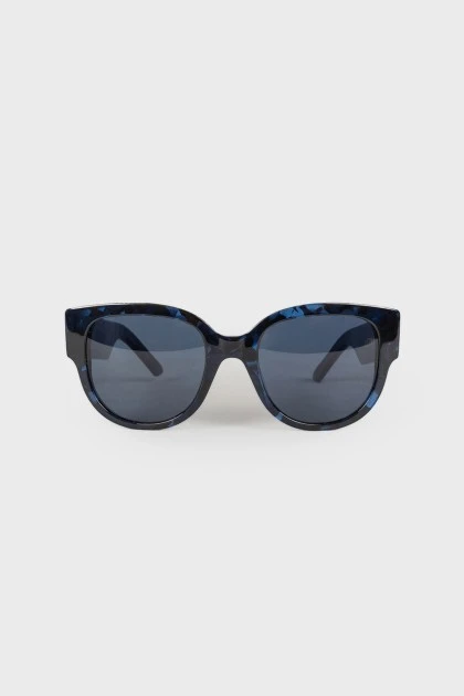 Blue sunglasses with brand logo