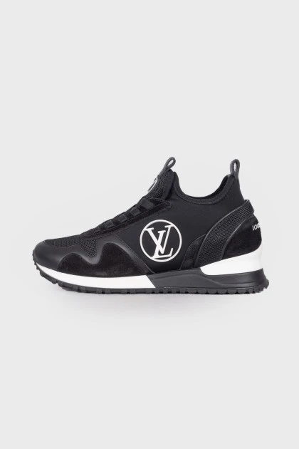 Black sneakers with brand logo